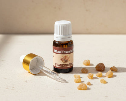 Frankincense essential oil bottle with the glass pipette dropper and push-in drop reducer