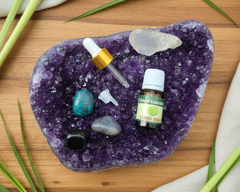 Lemongrass essential oil with the glass dropper and drop reducer on amethyst