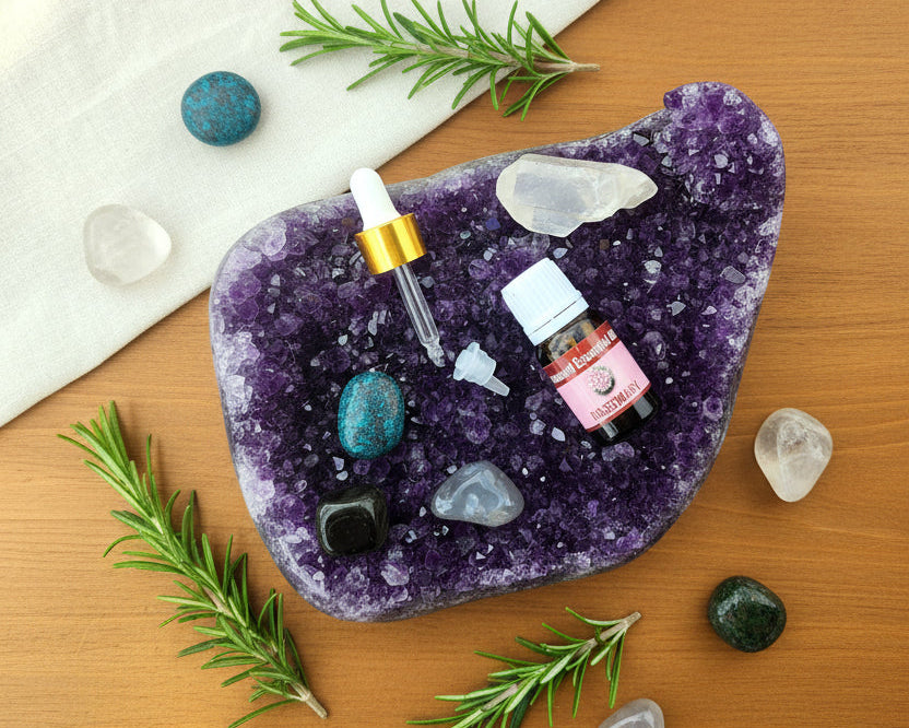 Rosemary essential oil with the glass dropper and drop reducer on amethyst
