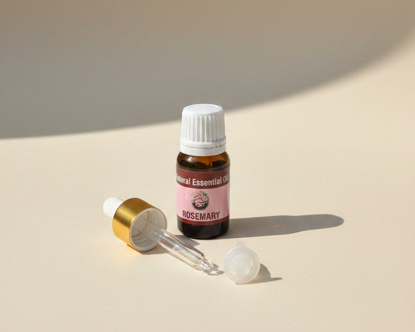 Rosemary essential oil bottle with the glass pipette dropper and push-in drop reducer